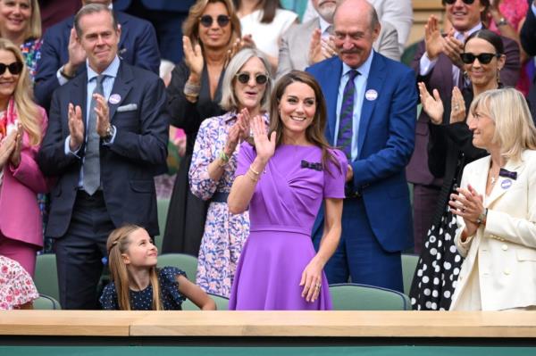 Princess Charlotte of Wales in purple dress receiving standing ovation, with Stefan Edberg, Stan Smith, Bec Hewitt, and other celebrities at Wimbledon 2024